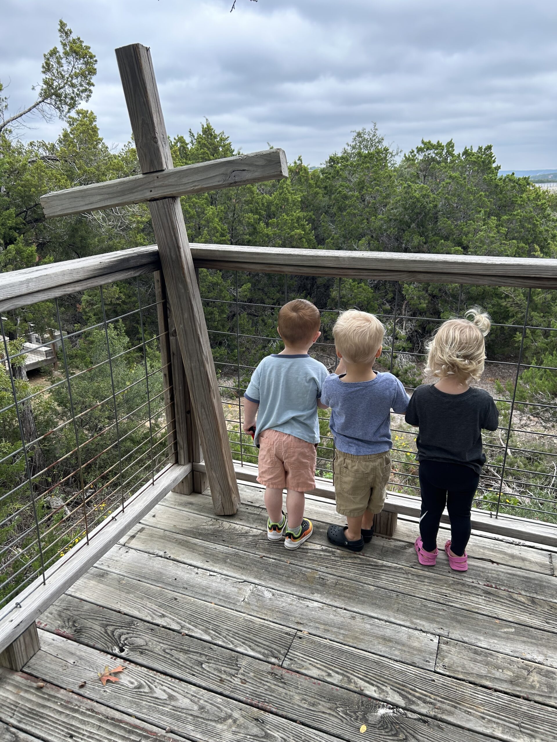 3 kids with cross